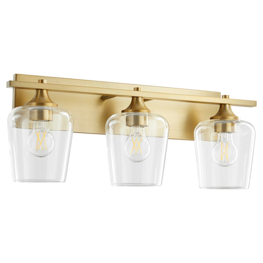  Veno Three Light Vanity by Quorum in Aged Brass Finish (558-3-80)